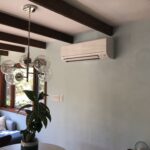 Mini split installation San Diego - Mitsubishi mini split system installed on a wall by expert HVAC contractor in San Diego