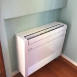 Floor mount indoor air handler by Mitsubishi installed in San Diego, CA by American Comfort Services